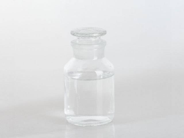 Large circular container filled with fine white zinc chloride powder lined with plastic