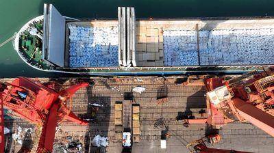 An aerial view of a massive chemical logistics and distribution center, showcasing infrastructure.