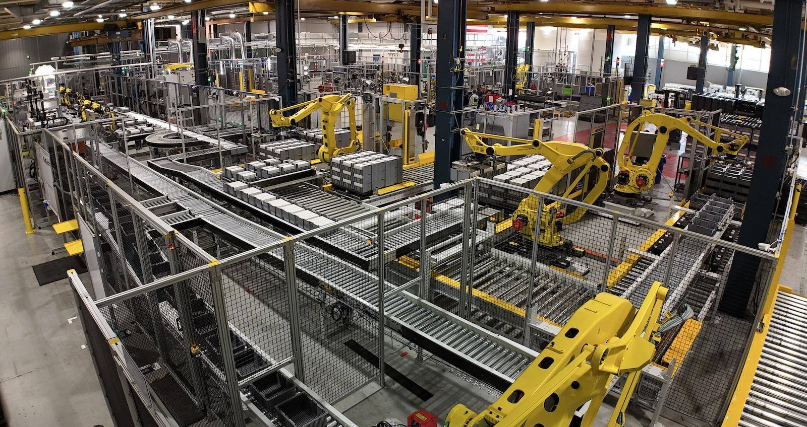  A faceless view of a large-scale industrial energy storage facility featuring advanced zinc-based battery modules.